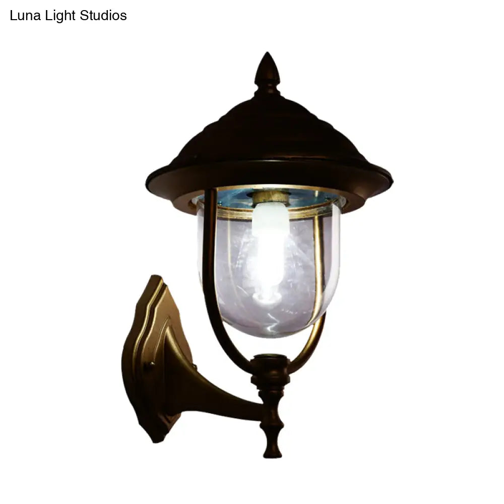 Lodges Urn 1-Light Sconce: Sleek Black/Brass Wall Lighting With Clear Glass Shade