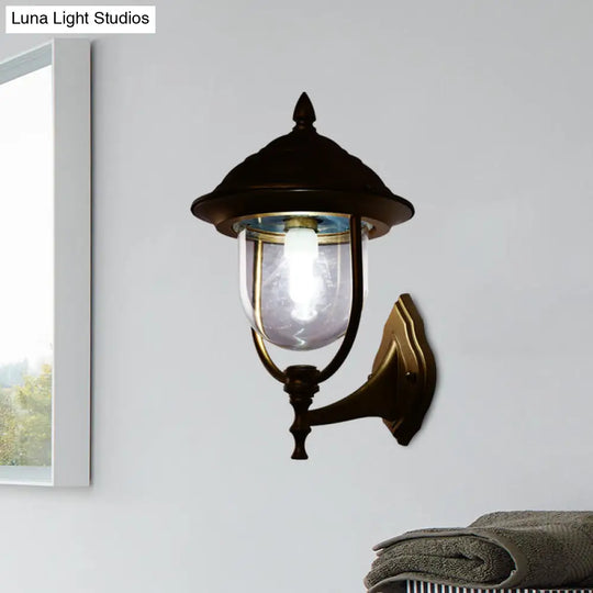 Lodges Urn 1-Light Sconce: Sleek Black/Brass Wall Lighting With Clear Glass Shade