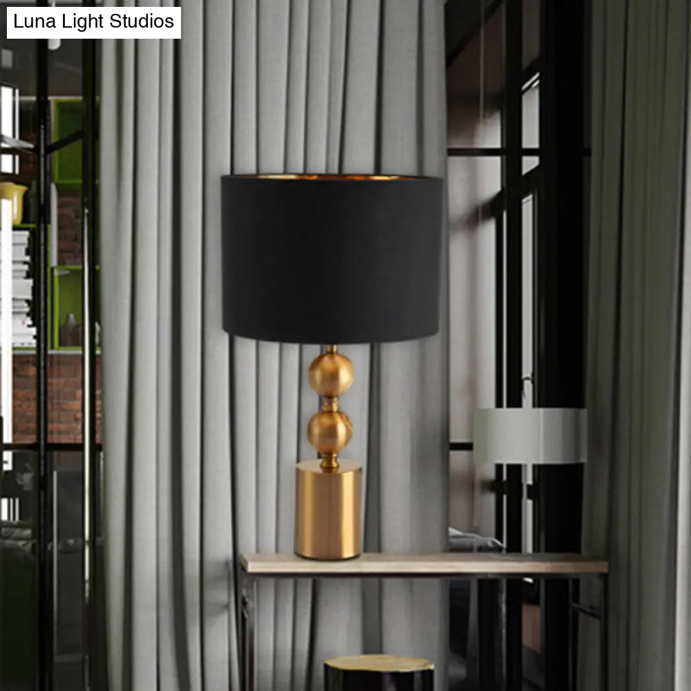 Sleek Black Desk Lamp With Cylinder Fabric Shade Elegance In Simplicity