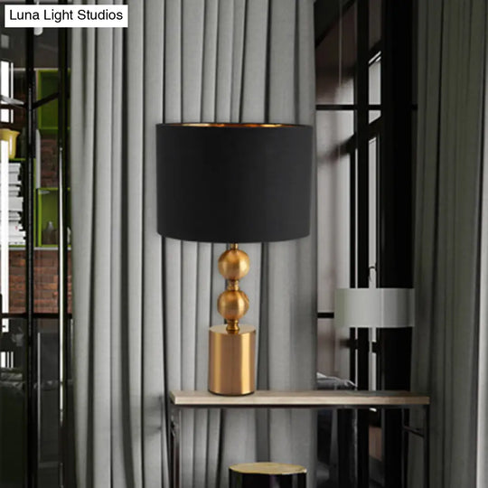 Sleek Black Desk Lamp With Cylinder Fabric Shade Elegance In Simplicity