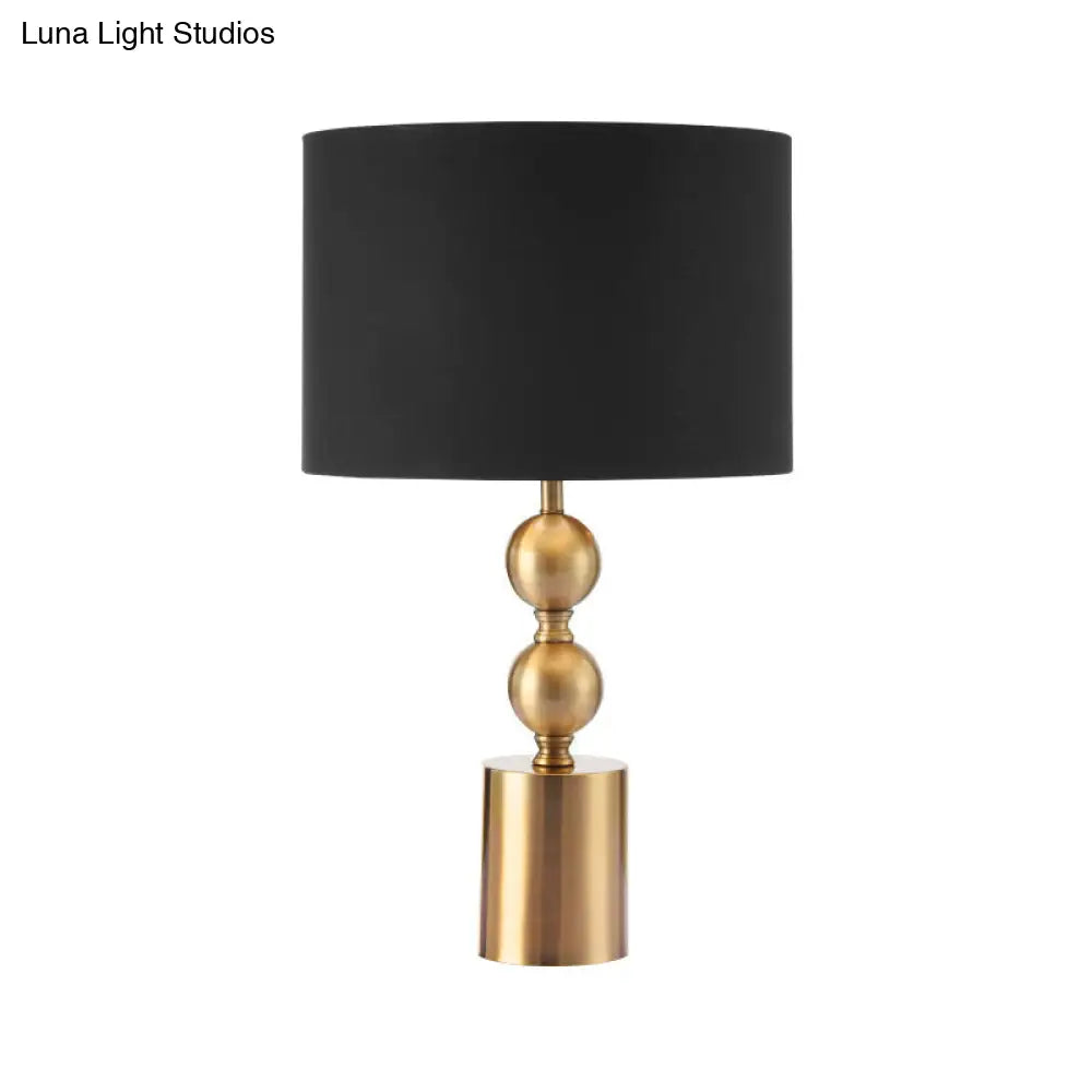 Sleek Black Desk Lamp With Cylinder Fabric Shade Elegance In Simplicity