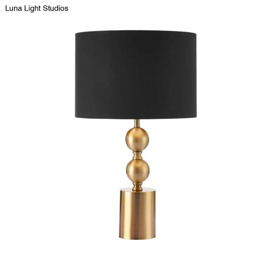 Sleek Black Desk Lamp With Cylinder Fabric Shade Elegance In Simplicity