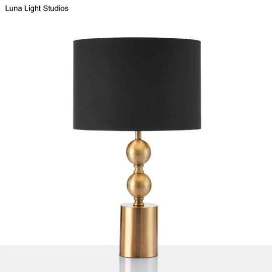 Sleek Black Desk Lamp With Cylinder Fabric Shade Elegance In Simplicity