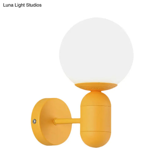 Metal Capsule Sconce Light With Globe Shade - Macaron Style Wall Lamp