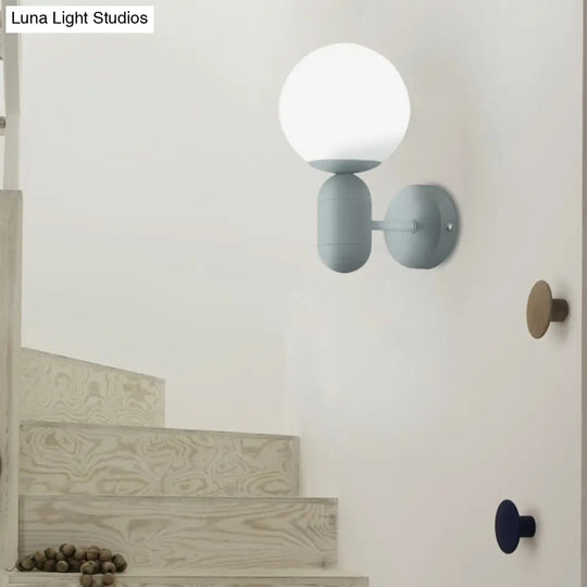 Metal Capsule Sconce Light With Globe Shade - Macaron Style Wall Lamp