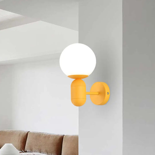 Metal Capsule Sconce Light With Globe Shade - Macaron Style Wall Lamp Yellow