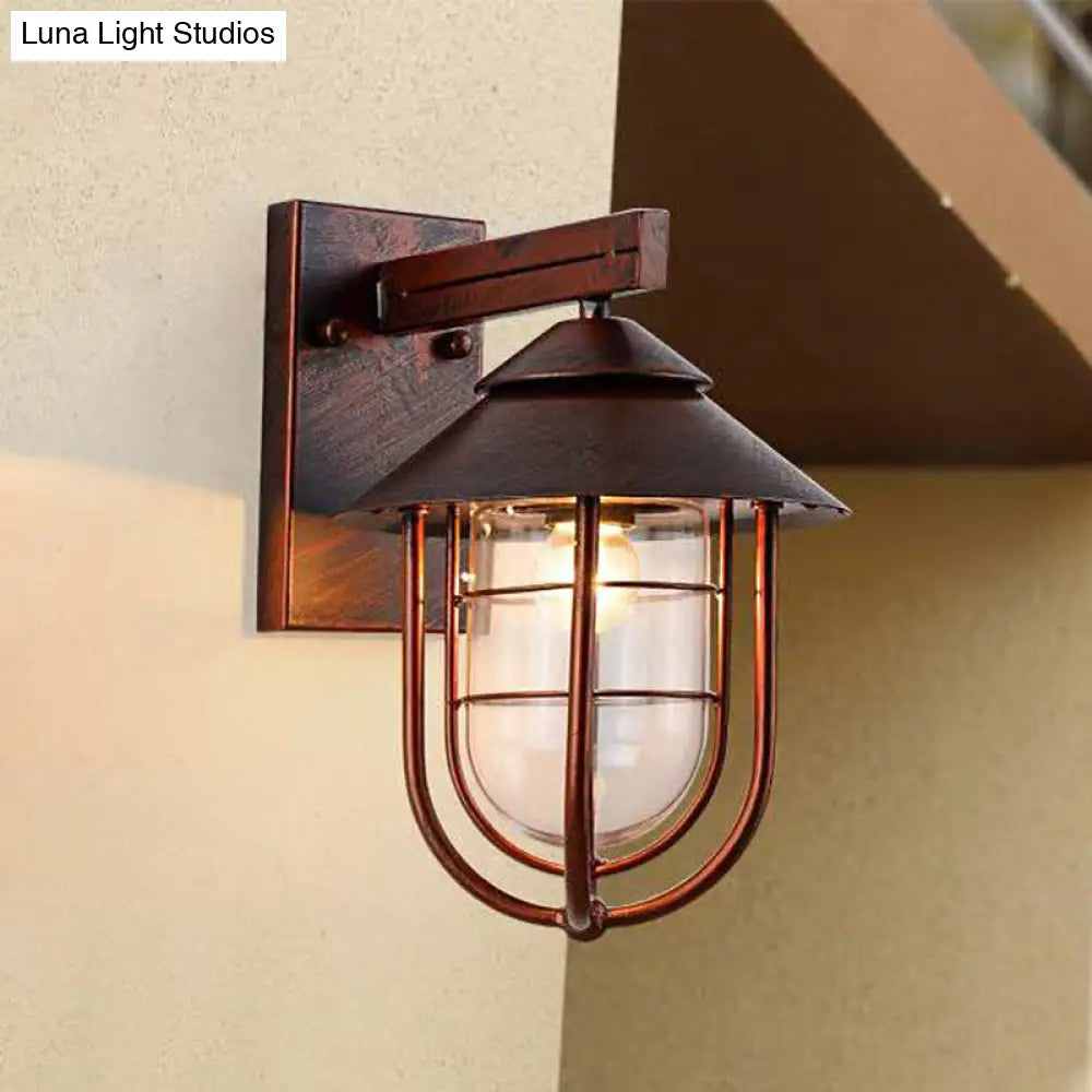 Metal Lantern Balcony Wall Sconce With Oval Clear Glass Shade - Weathered Copper/Black Finish