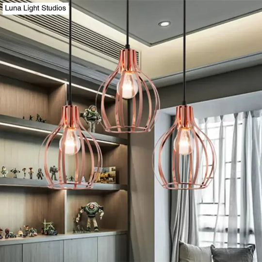 Industrial Style Metallic Rose Gold Pendant Lighting With 3 Lights And Global Cage Shade