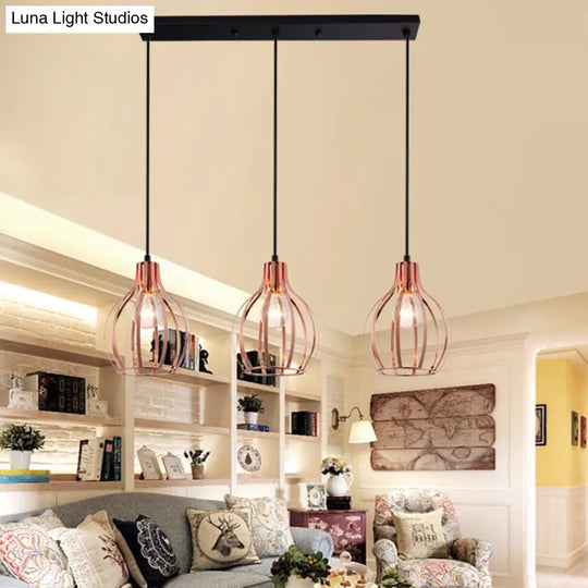 Industrial Style Metallic Rose Gold Pendant Lighting With 3 Lights And Global Cage Shade