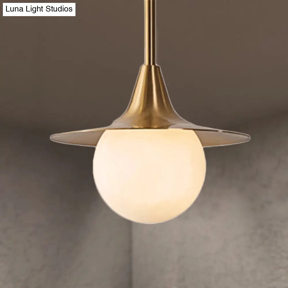 Mid Century Brass Pendant Light With Flared Milk Glass Ball Shade Ideal For Dining Table