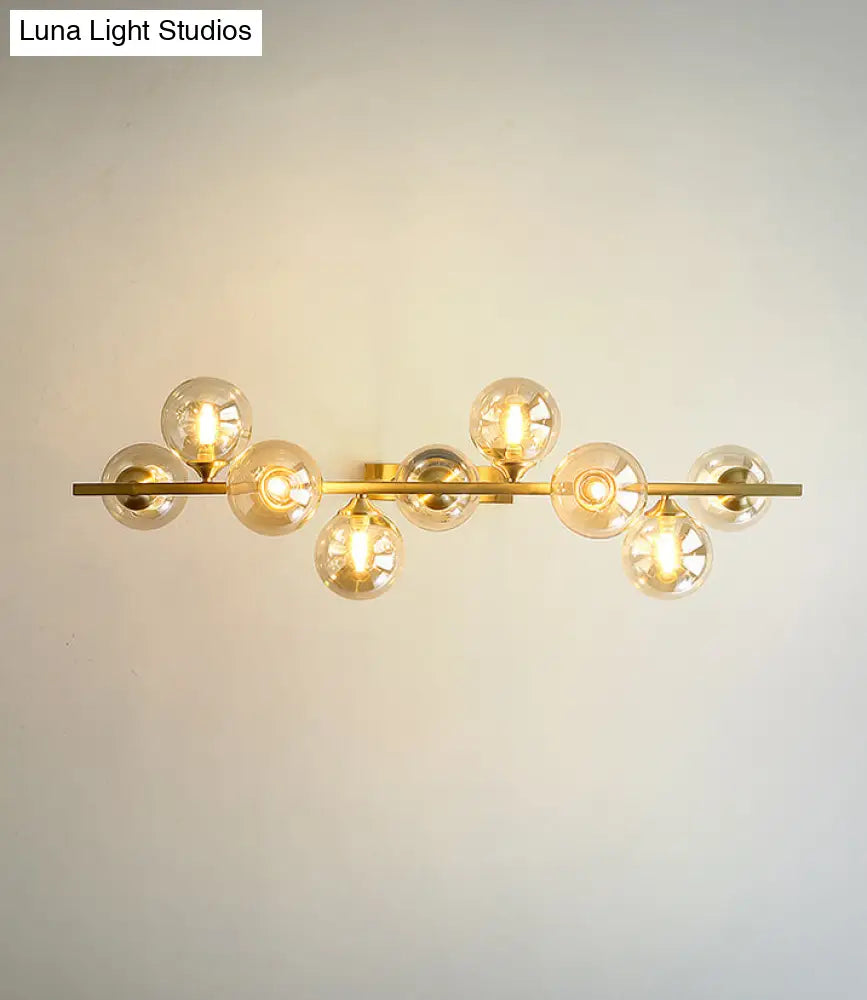 Mid-Century Modern Gold Metal Pendant With Spherical Amber Glass - Island Ceiling Light For Dining