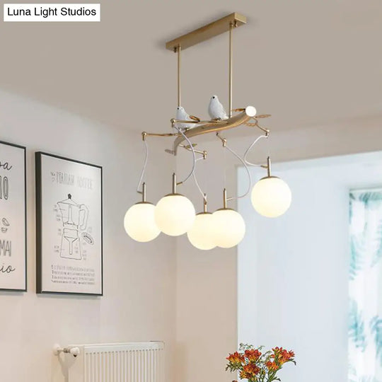 Milky Blown Glass Sphere Chandelier Pendant With Gold Finish - Postmodern 5-Head Hanging Light Kit