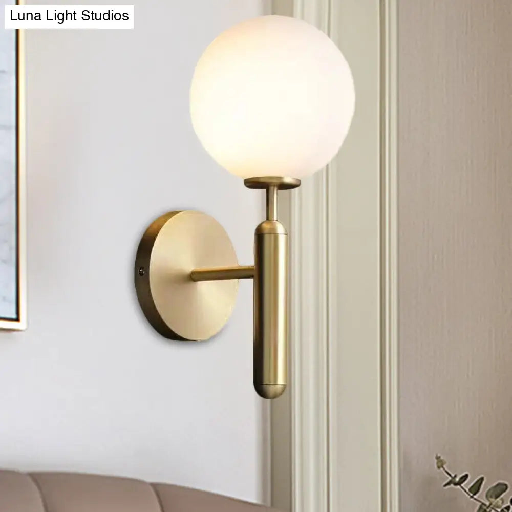 Milky Glass Ball Sconce - Contemporary 1-Head Brass Wall Light Fixture With Metal Arm