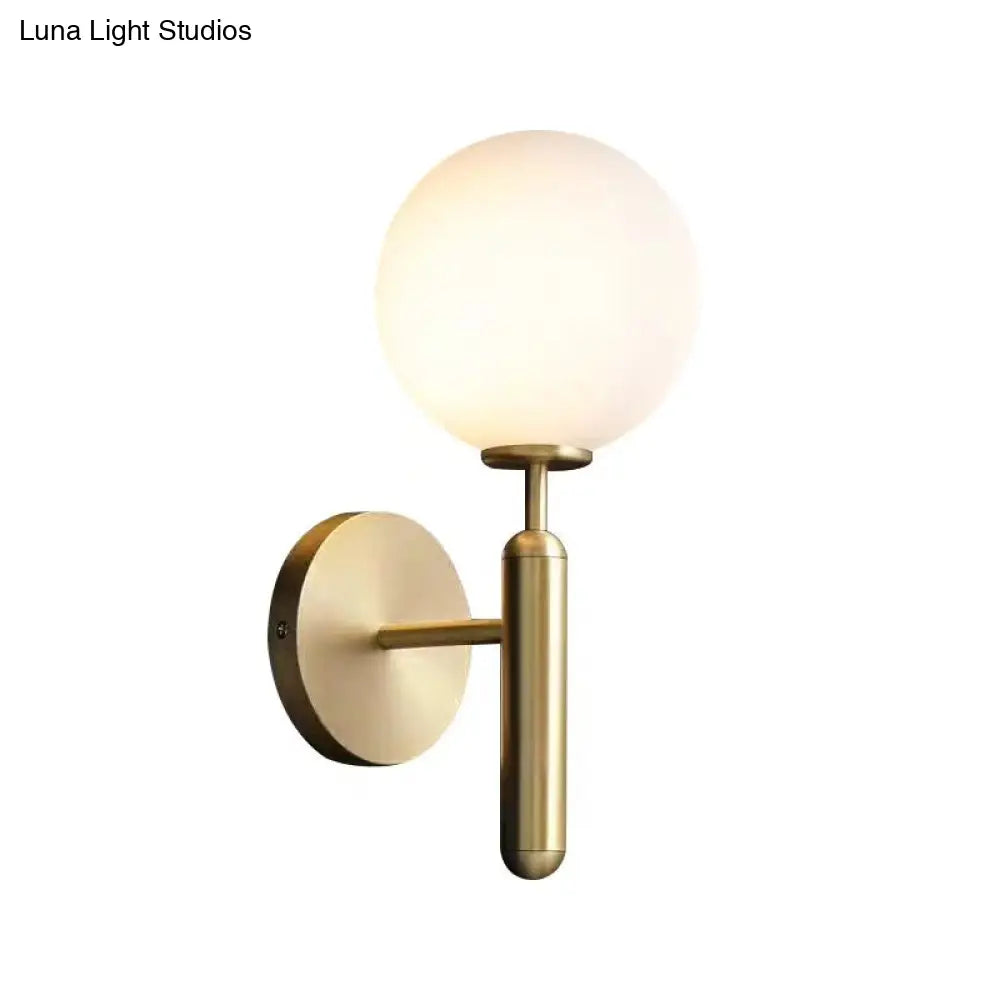 Milky Glass Ball Sconce - Contemporary 1-Head Brass Wall Light Fixture With Metal Arm