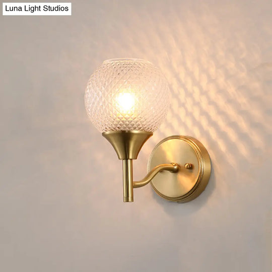 Minimal Single Light Brass Wall Sconce With Spherical Prismatic Glass