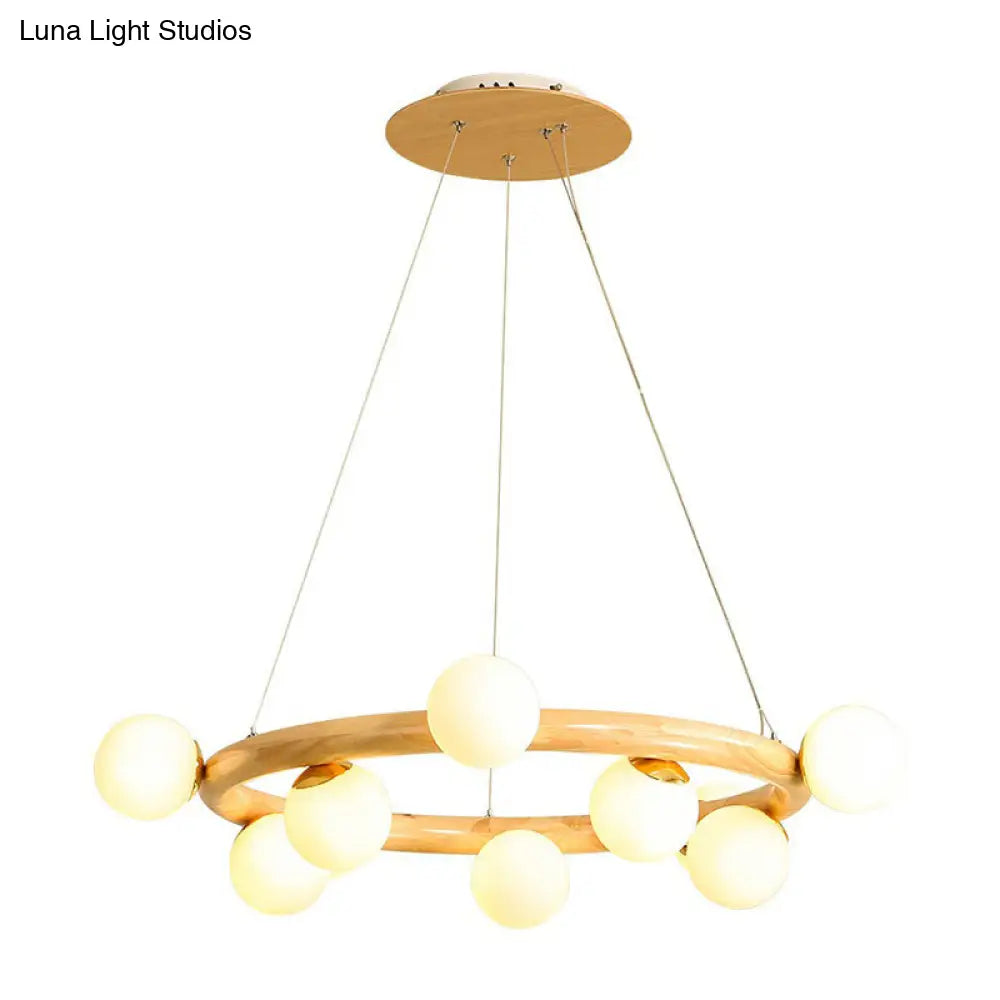 Minimalistic Circular Wood Pendant Chandelier With Beige Hanging Light And White Glass Orb Shade