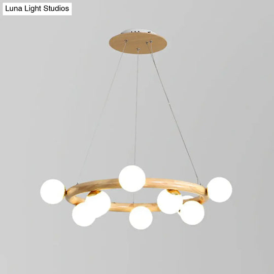 Minimalistic Circular Wood Pendant Chandelier With Beige Hanging Light And White Glass Orb Shade 10