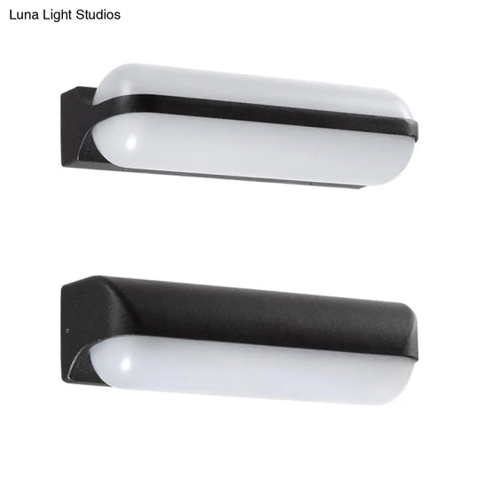 Minimalist Black Acrylic Led Wall Sconce For Yard - Capsule Shape