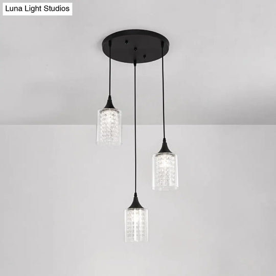 Minimalist Black Pendulum Lamp With 3-Light Clear Glass Cylinder And Linear/Round Canopy