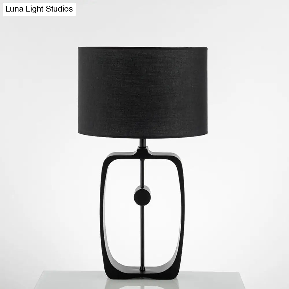 Minimalist Black Fabric Table Lamp With Round Shape And Open Base