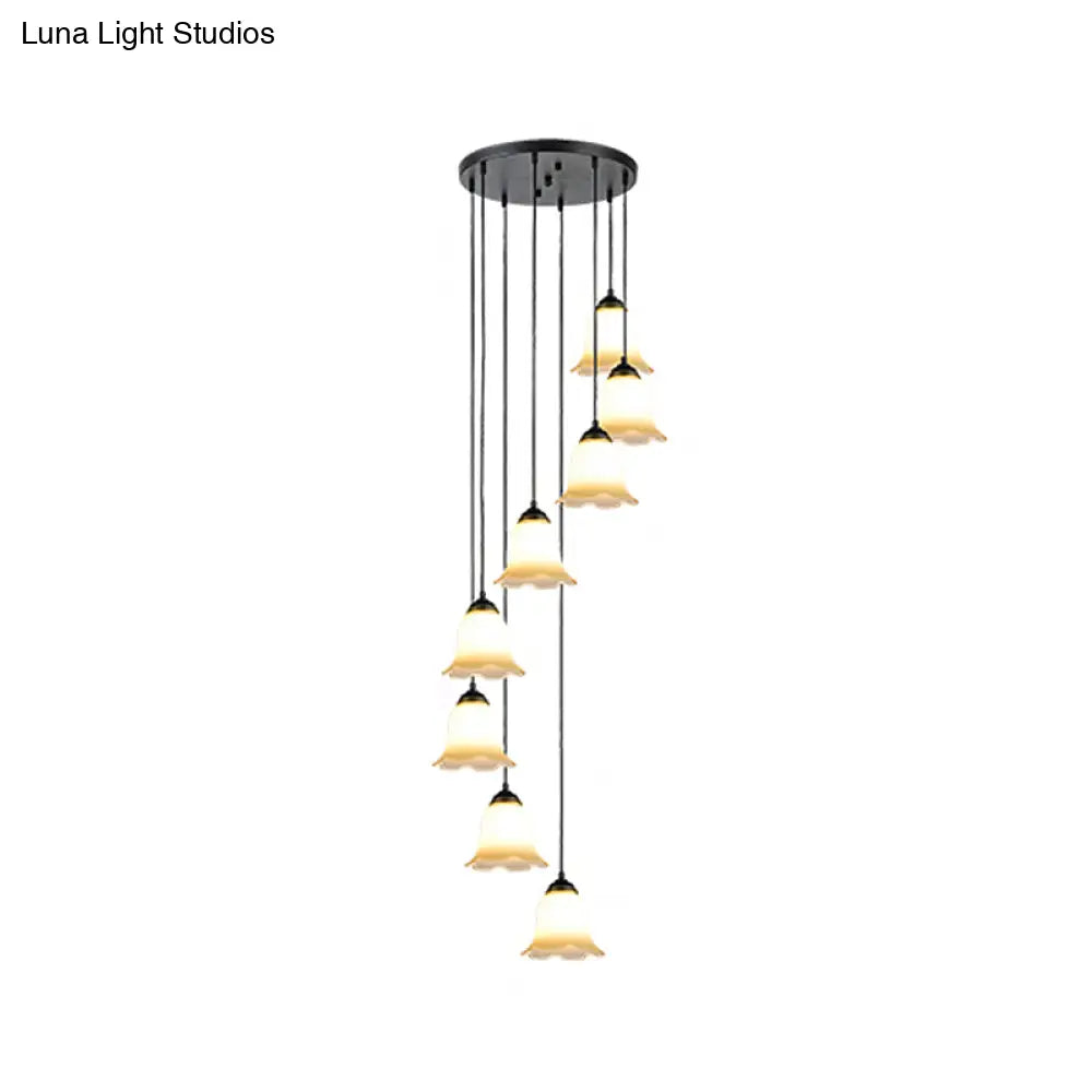 Minimalist Black Flower Stairs Pendant Light With Frosted Glass And Round Canopy