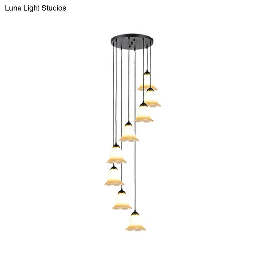 Minimalist Black Flower Stairs Pendant Light With Frosted Glass And Round Canopy