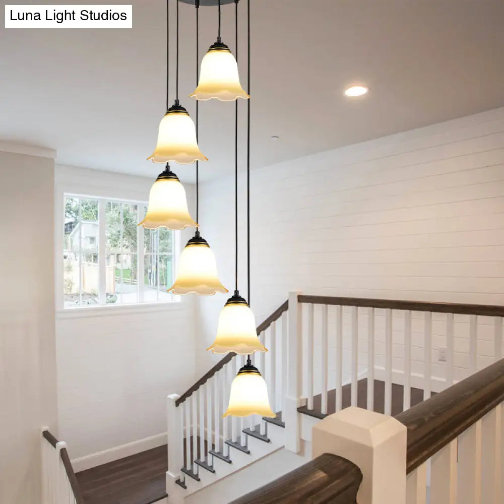 Minimalist Black Flower Stairs Pendant Light With Frosted Glass And Round Canopy