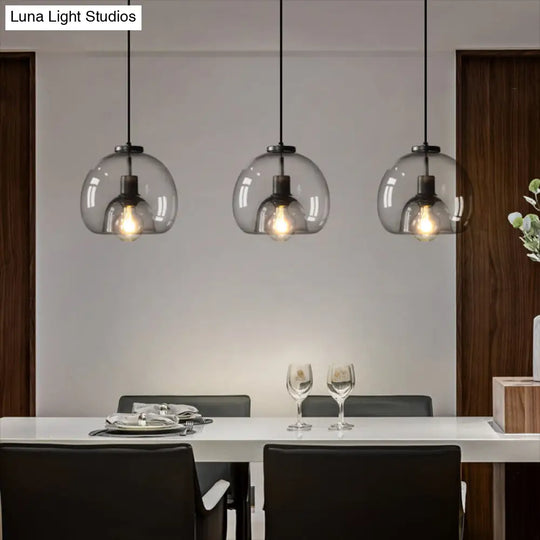 Minimalist Black Glass Pendant Light For Modern Dining Rooms