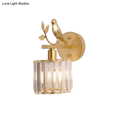 Minimalist Black/Gold Wall Sconce With K9 Crystal Cylinder And Bird Detail - 1 Bulb Light