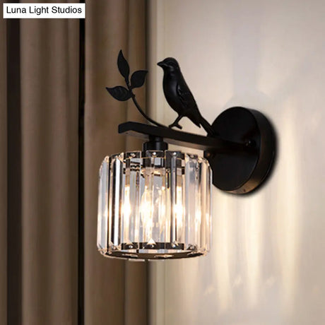 Minimalist Black/Gold Wall Sconce With K9 Crystal Cylinder And Bird Detail - 1 Bulb Light