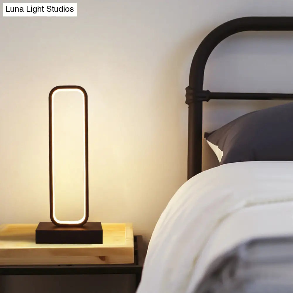 Minimalist Black Metal Led Bedside Table Lamp With Rounded Edges