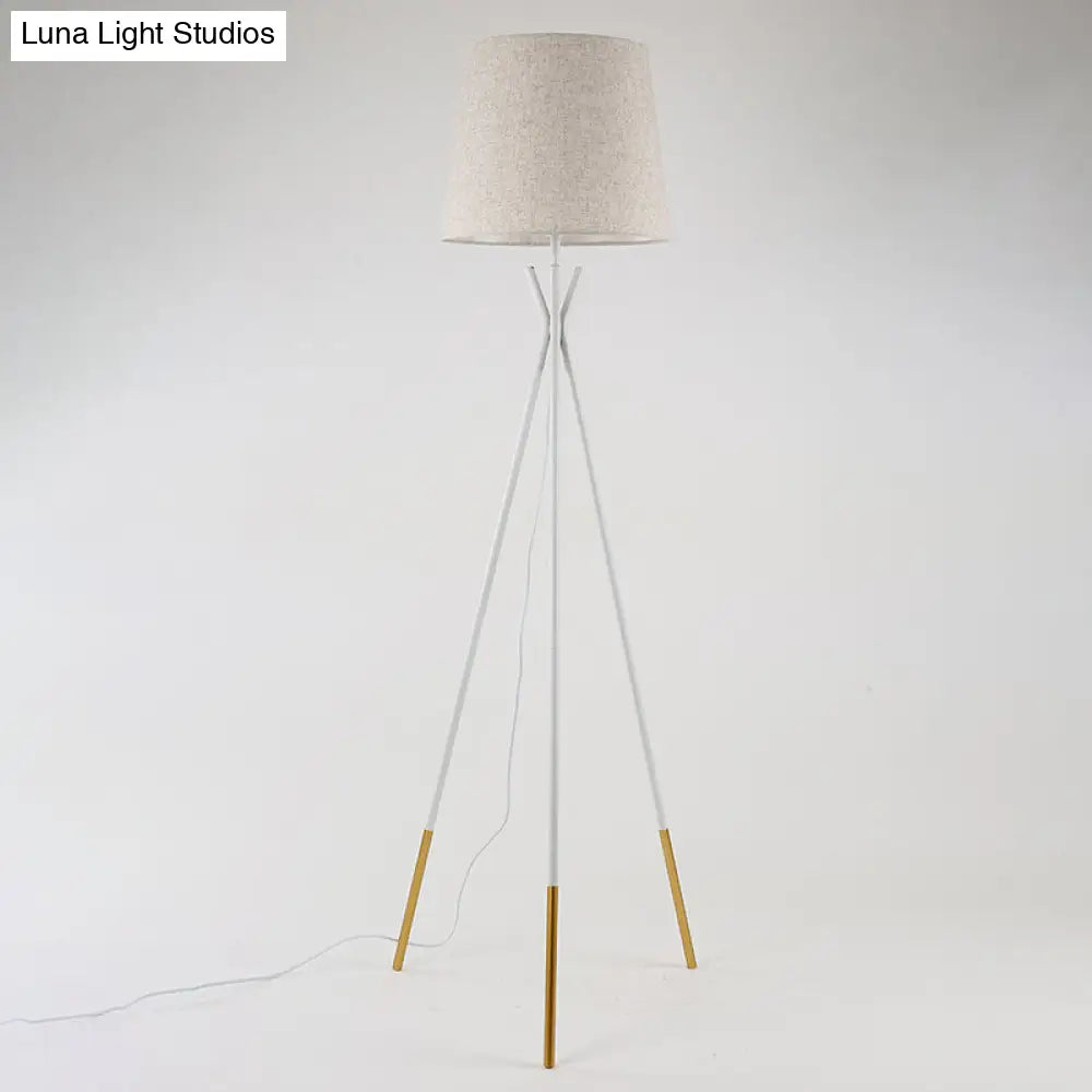 Minimalist Black/White Tapered Floor Lamp With Brass Accents