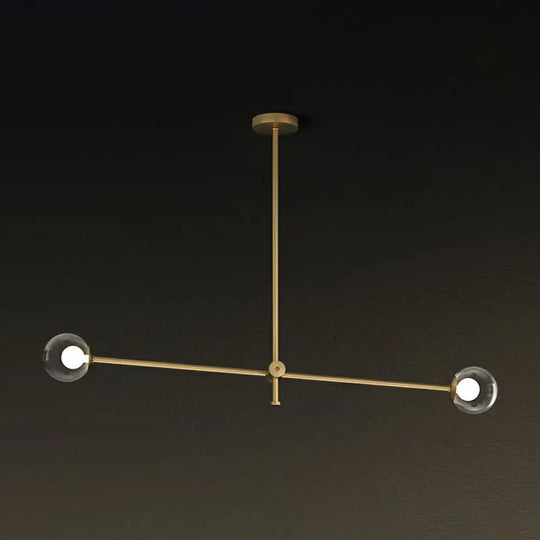 Minimalist Brass Finish Chandelier With Swivel Arm And Glass Shade 2 / Clear