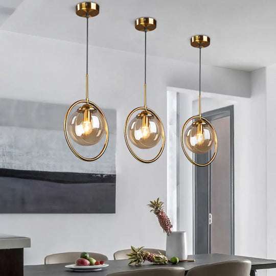 Minimalist Brass Plated Ball Drop Pendant Light With Clear Glass And Ring Decoration Amber