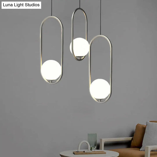 Minimalist Chrome Orb Pendant Light With White Glass Shade