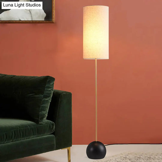 Minimalist Flaxen/Beige 1-Light Standing Floor Lamp With Cylindrical Fabric Shade - Ideal For Living