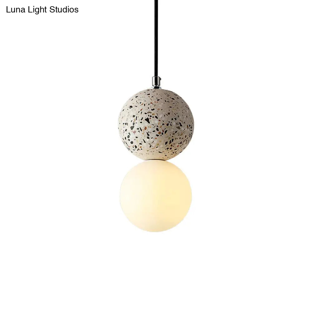 Minimalist Frosted Glass Pendant Light With Terrazzo Decor For Dining Room