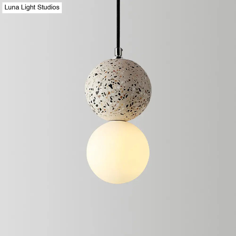 Minimalist Frosted Glass Pendant Light With Terrazzo Decor For Dining Room