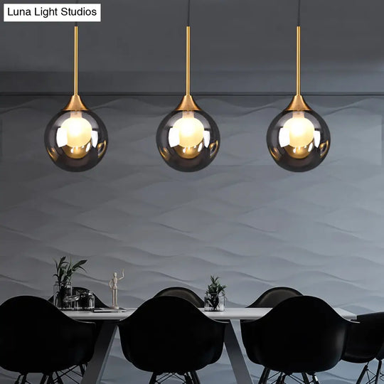 Minimalist Glass Pendant Light With 3-Head Design For Dining Room And Multiple Hanging Options