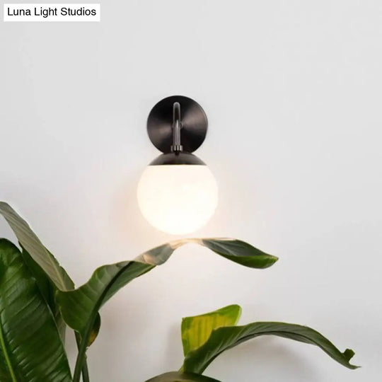 Minimalist Golden/Black Wall Sconce Light With Milky Glass Ball Shade - 1-Bulb Bedside Lamp
