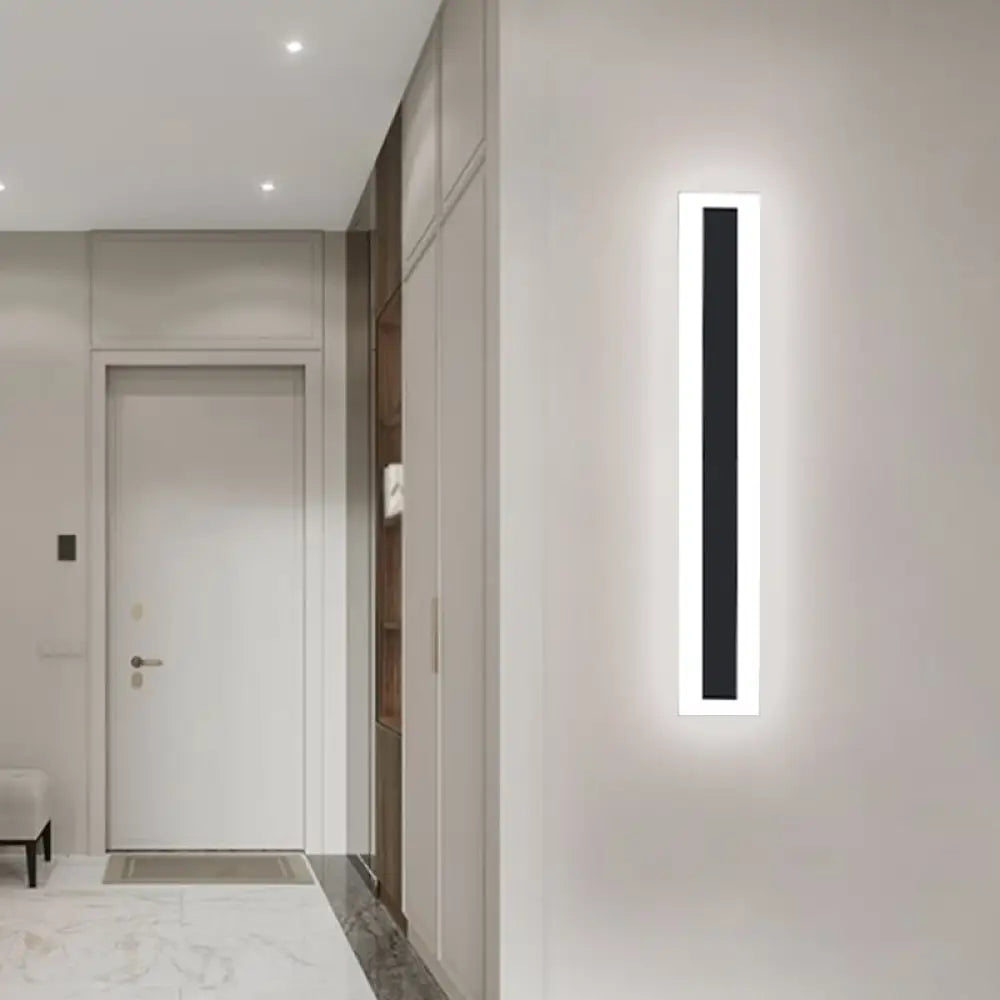 Minimalist Led Wall Sconce With Black Metal Frame And Acrylic Shade