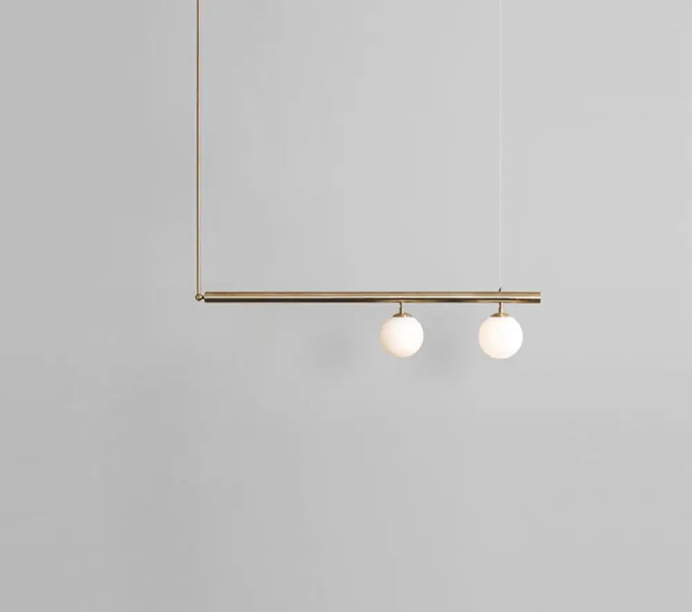 Minimalist Metal Pendant Lighting With Gold Accents - Modern Globe Glass Island Ceiling Light For