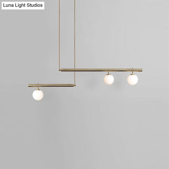 Minimalist Metal Pendant Lighting With Gold Accents - Modern Globe Glass Island Ceiling Light For