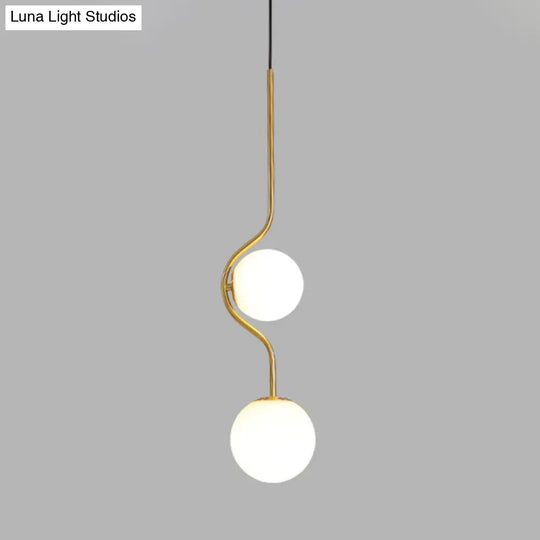 Minimalist Milky Glass Orb Pendant Light With Gold Pendulum And Metal Frame