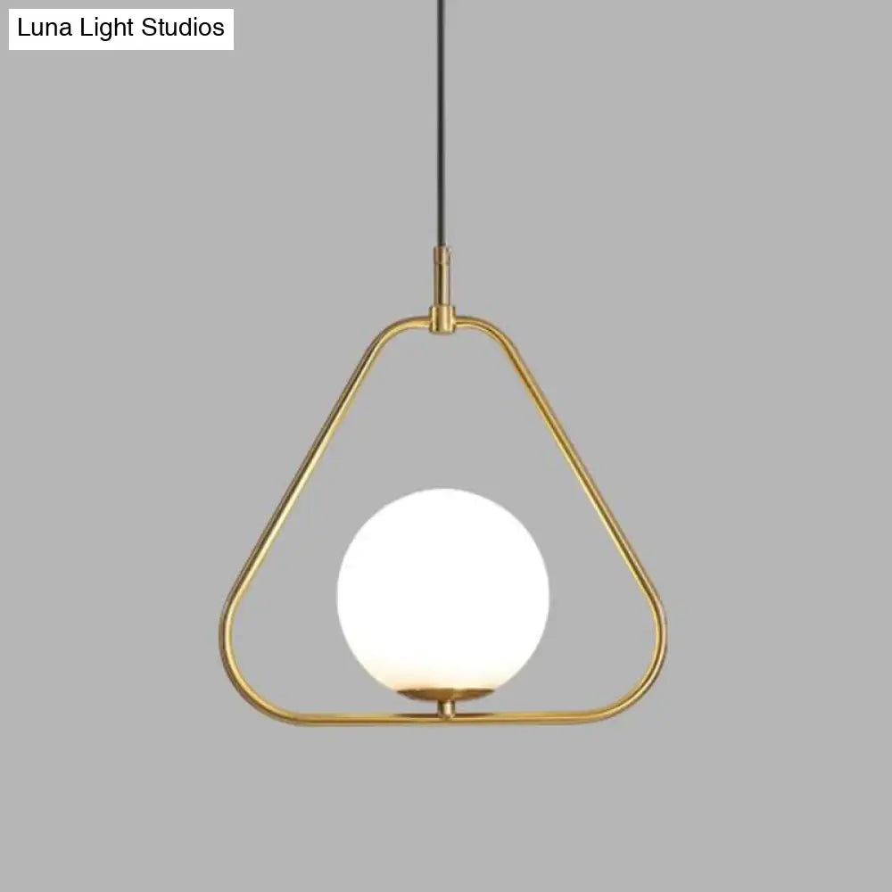 Minimalist Milky Glass Orb Pendant Light With Gold Pendulum And Metal Frame / B