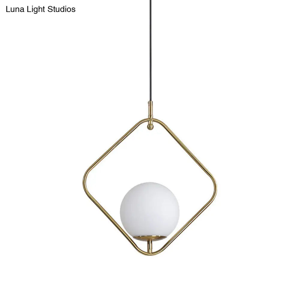 Minimalist Milky Glass Orb Pendant Light With Gold Pendulum And Metal Frame