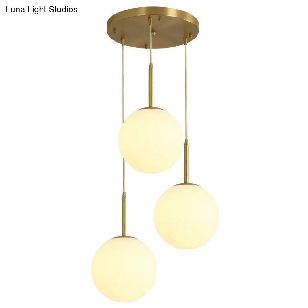 Minimalist Opal Glass Sphere Pendant Light With 3-Bulb Gold Pendulum Design - Ideal For Dining Room