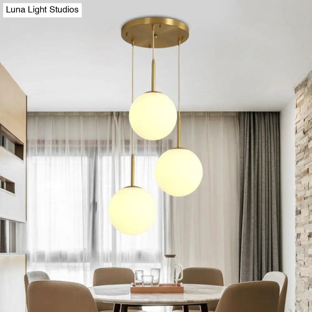 Minimalistic 3-Bulb Gold Pendant Light For Dining Room - Opal Glass Sphere Design / 12