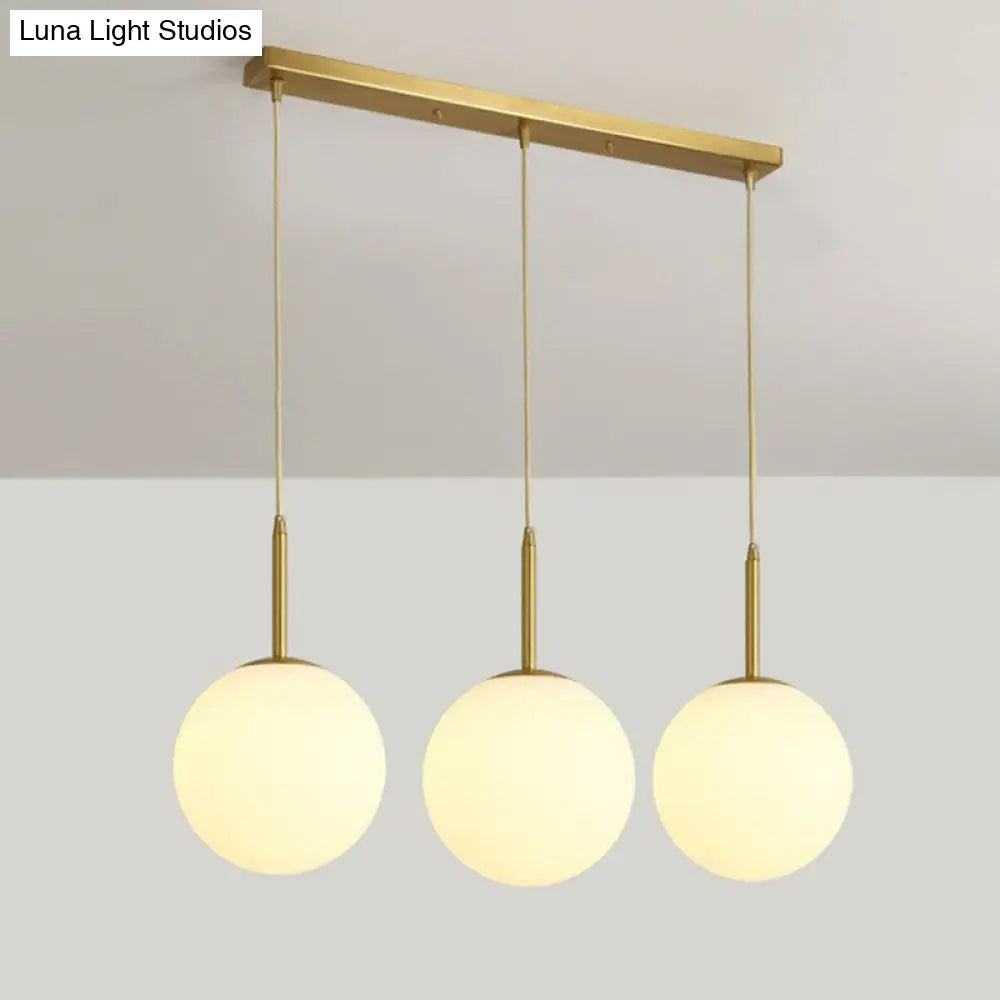 Minimalistic 3-Bulb Gold Pendant Light For Dining Room - Opal Glass Sphere Design / 23.5