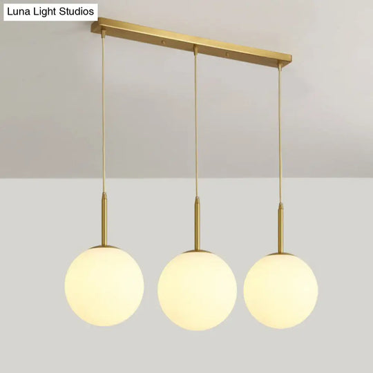 Minimalistic 3-Bulb Gold Pendant Light For Dining Room - Opal Glass Sphere Design / 23.5